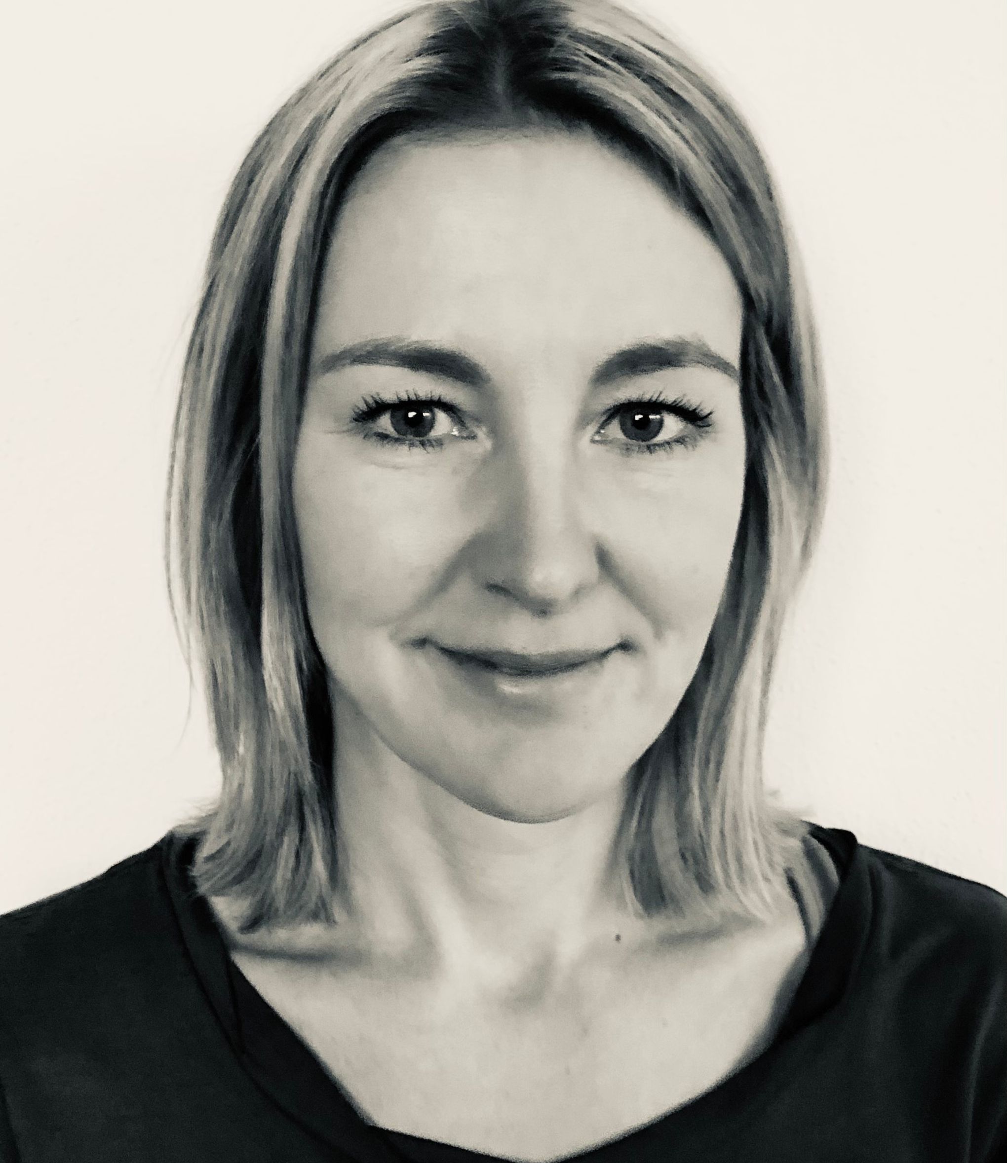 Office manager, Corinna Päffgen, smiling